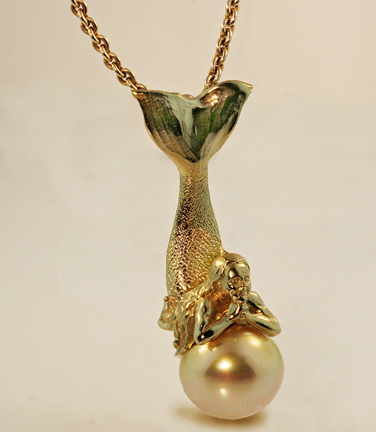 Mermaid Resting on a Pearl, 14K Gold